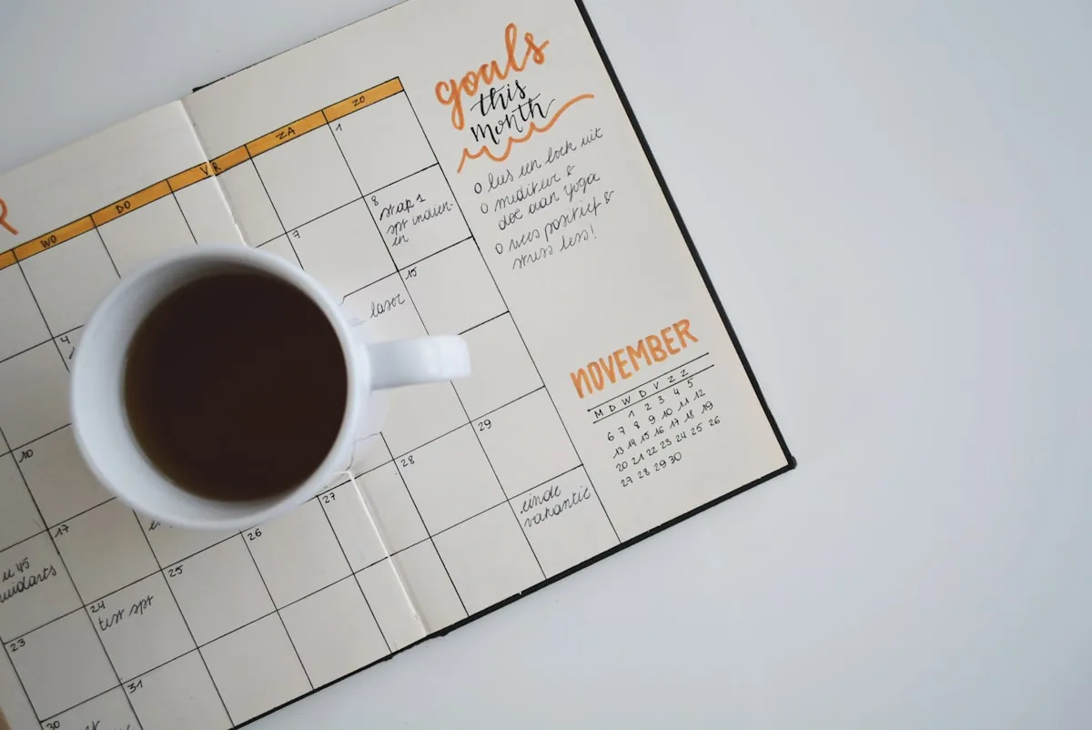 Morning coffee and journal representing a productive remote work morning routine