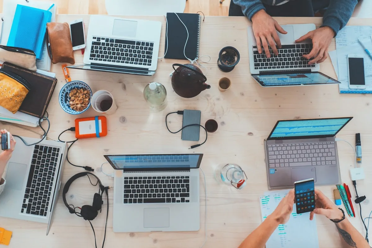Digital nomad travel tech setup with laptop and accessories